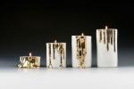 Porseleinen kandelaars met druppelend goud 'Melting Wax' hebben de Wow-factor