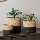 Drie monochrome jute manden